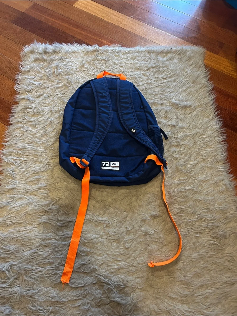 Nike Navy And Teal Kids Backpack with Green Logo and Orange Straps